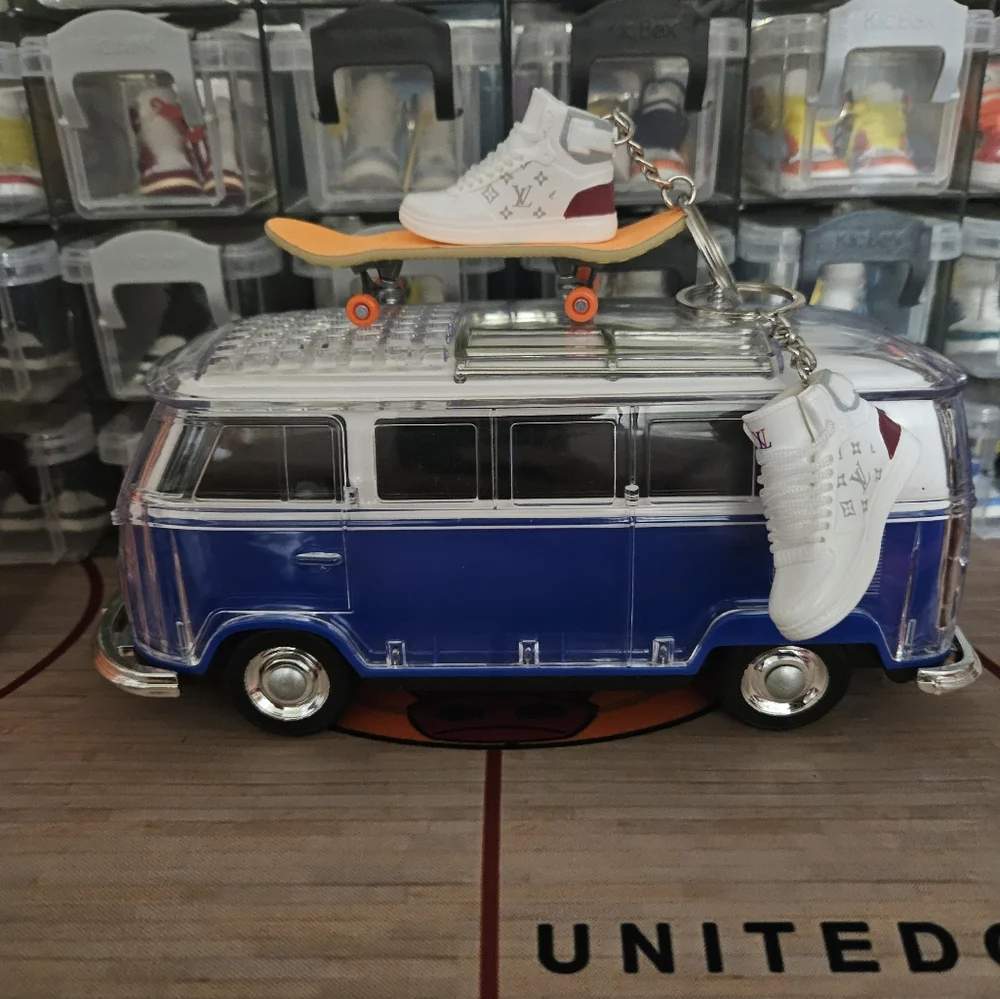 Fashion pair of mini sneakers keychain.